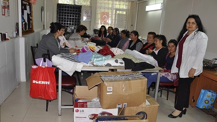 Halk Eğitim Kursuna nakış ve kumaş desteği 