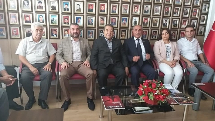 MHP heyetinden şehit ve gazi derneğine ziyaret 